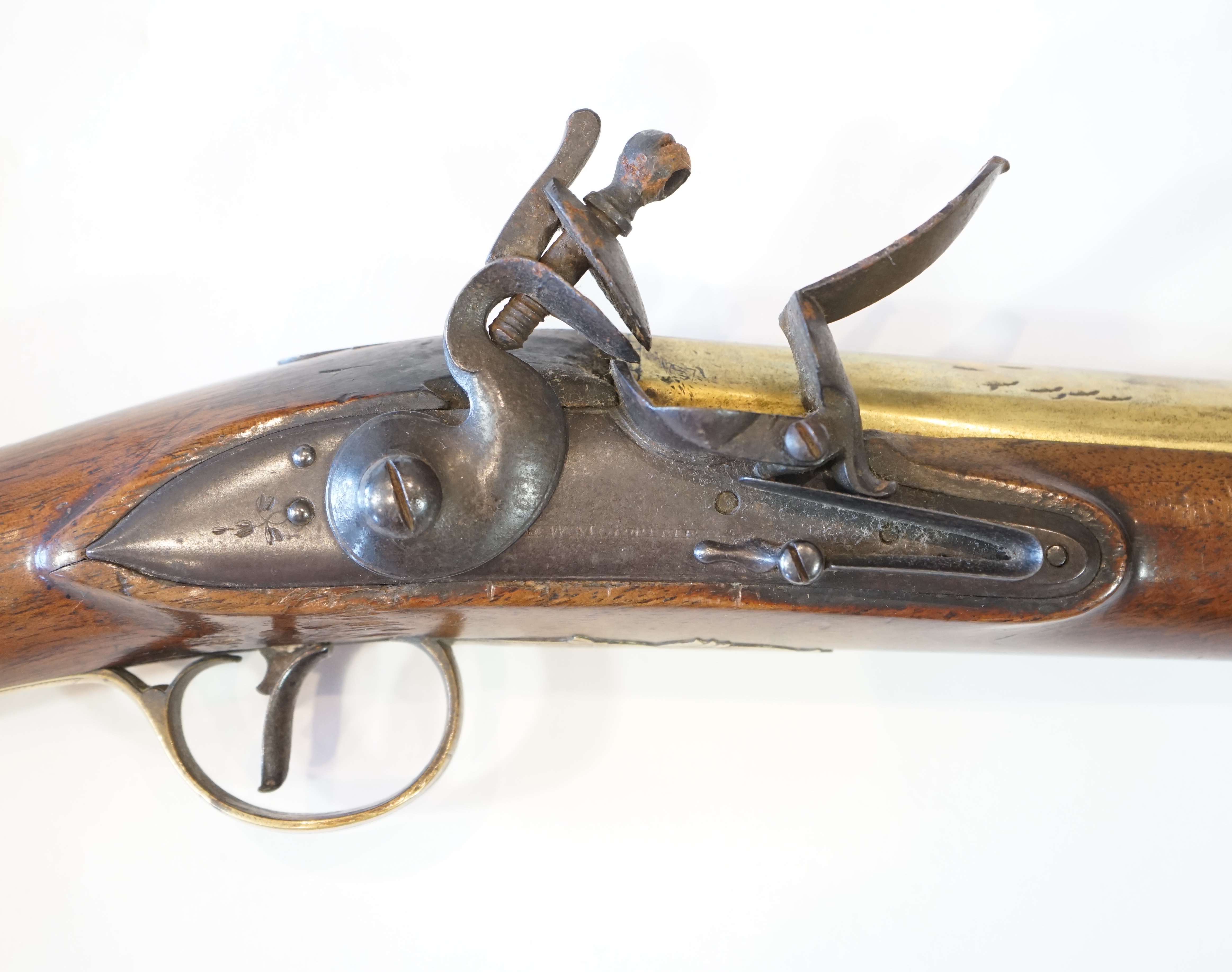 An English brass barrel flintlock blunderbuss by H W Mortimer, late 18th century